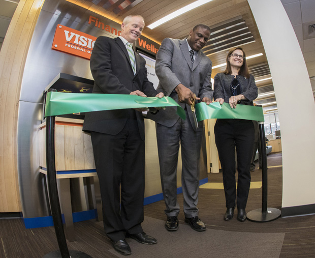 President Harvey Stenger; Tyrone Muse, president/CEO of Visions Federal Credit Union; and Kelli Smith, director of the Fleishman Center for Career and Professional Development, cut the ribbon during a Jan. 19 ceremony opening the Financial Wellness Center. 