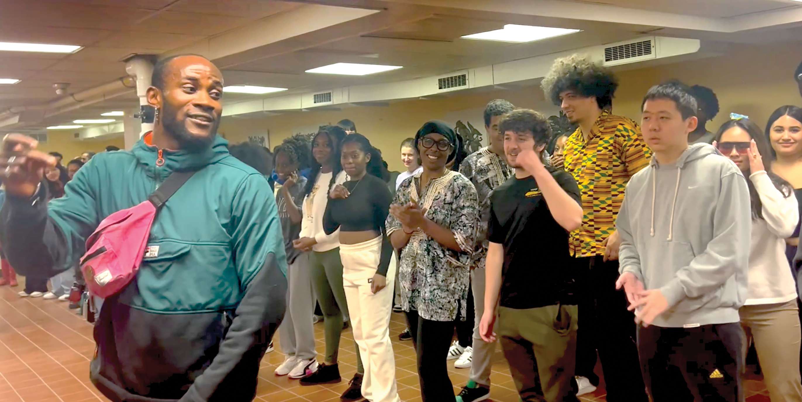 Choreographer Meka Oku teaches a master class at the Africana Festival in February at Africa House in Endicott,  N.Y. More than 120 students and faculty attended the festival, which was made possible thanks to a Mellon Foundation grant to support Africana Studies at Binghamton. 