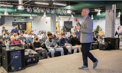 Daniel R. Black '94, a global recruiting leader at EY, gives a presentation on the power of networking. The program, in the Undergrounds of the Union at Binghamton, was presented in February 2022 by the Fleishman Center for Career and Professional Development. 