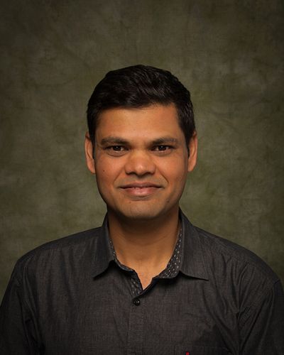 headshot of Amit Gupta