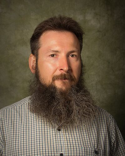 headshot of Aleksey Polunchenko