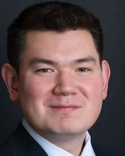 headshot of Benjamin  Dettelback