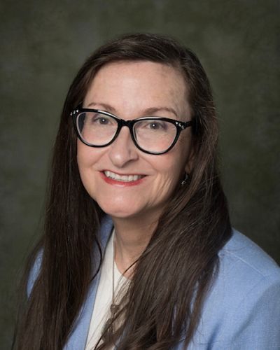 headshot of Carey Cadieux, PhD, RN, AHN-BC, RYT, FAAN