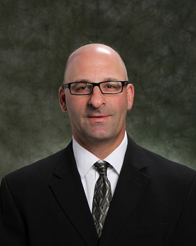headshot of Craig Dube