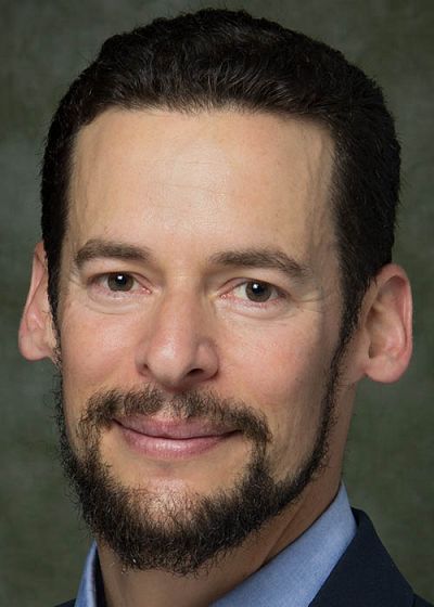 headshot of Carlos Gershenson-Garcia