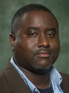 headshot of Christopher Greene