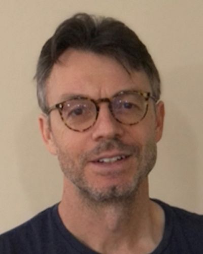 headshot of Dikran Karagueuzian