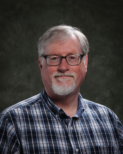 headshot of Dennis McGee