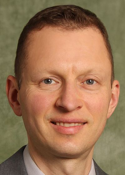 headshot of Dmitry Ponomarev