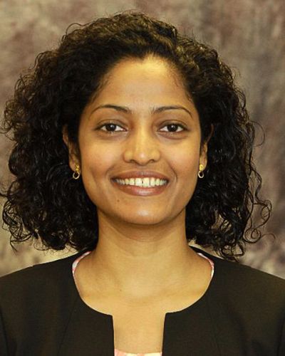 headshot of Deena Thomas