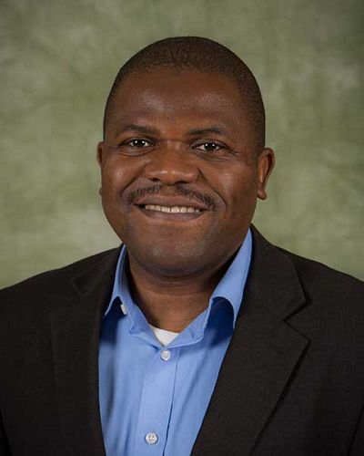 headshot of Komla Dzigbede