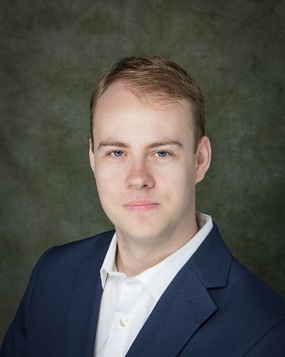 headshot of Evan  Gartner