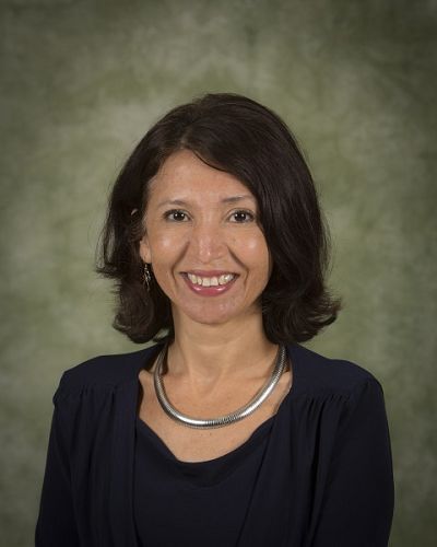 headshot of Emerita Hamdan