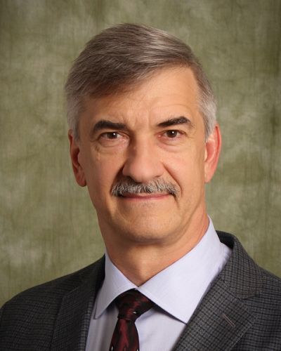 headshot of Eriks Rozners