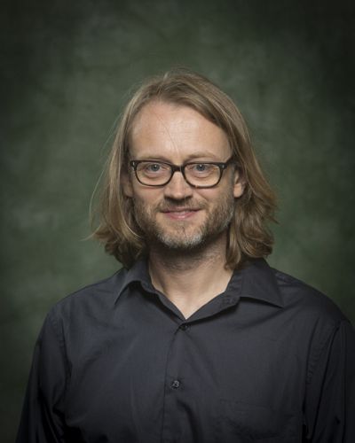 headshot of Gregory Key