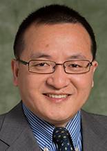 headshot of Guangwen Zhou