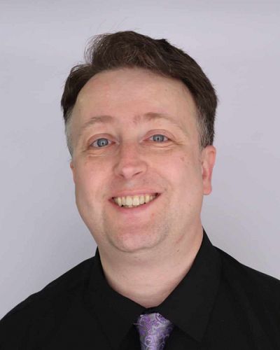 headshot of John  Isenberg