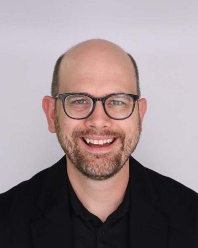 headshot of John Zilvinskis