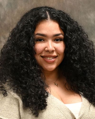 headshot of Jada Mayi