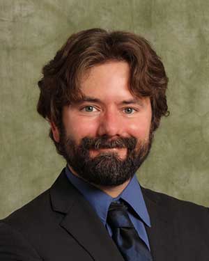 headshot of Joshua Reno