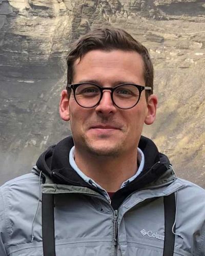 headshot of Justin Mann