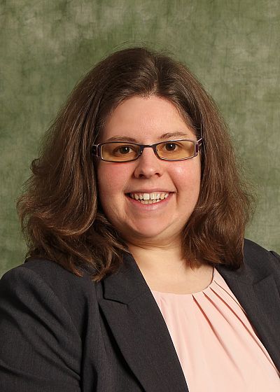 headshot of Kelly Bach, PharmD, BCPS, BCCCP, BCGP