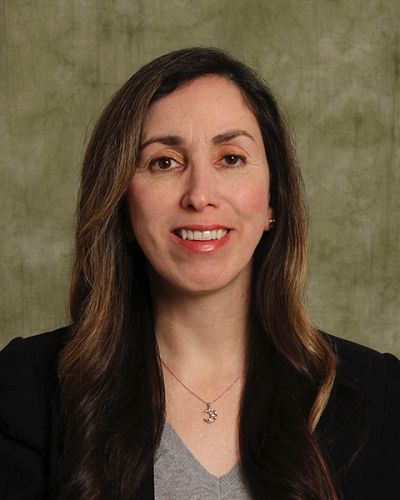 headshot of Lubna Omar