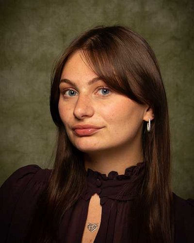 headshot of Mia  DeVito