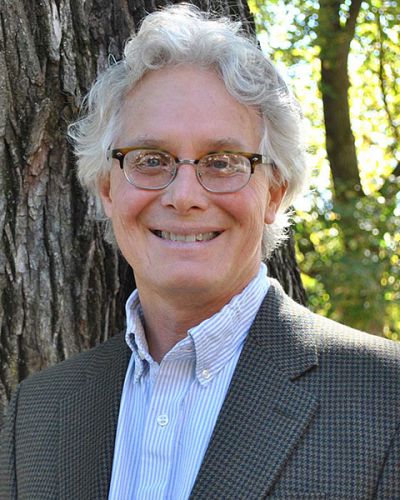 headshot of Mark Lenzenweger