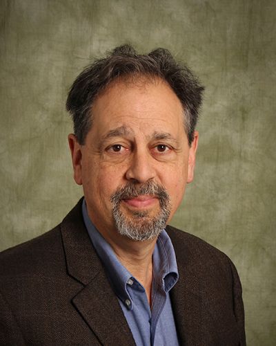 headshot of Maxim Pensky