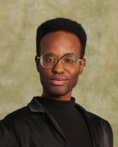 headshot of Melchizedek Robinson, LMSW