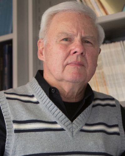 headshot of Norman Spear