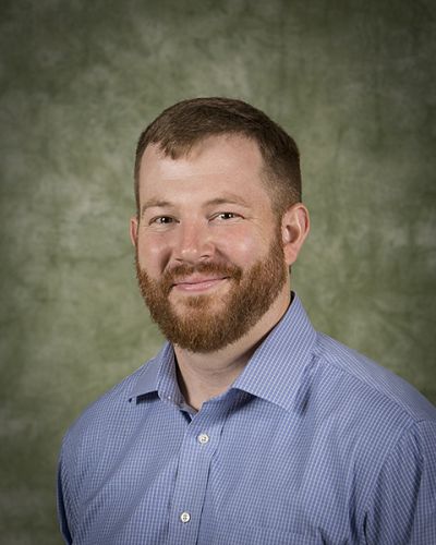 headshot of Thomas Powell