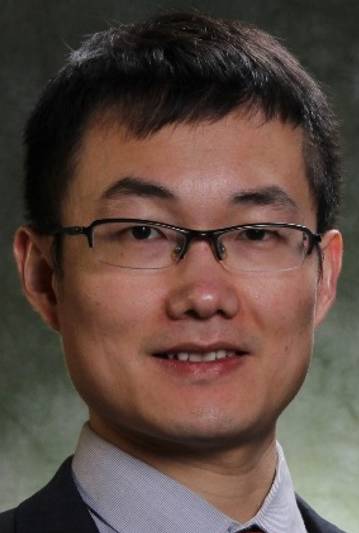 headshot of Pu Zhang