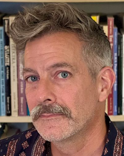 headshot of Paul Schleuse