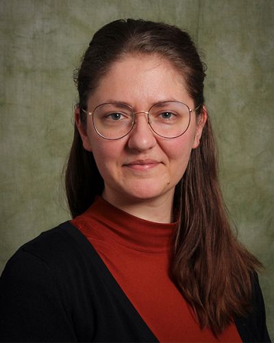 headshot of Sasha Frizzell