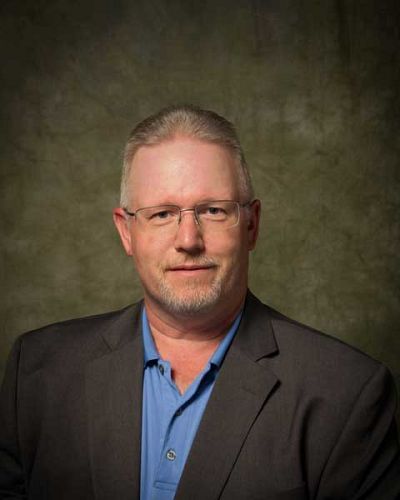 headshot of Scott May