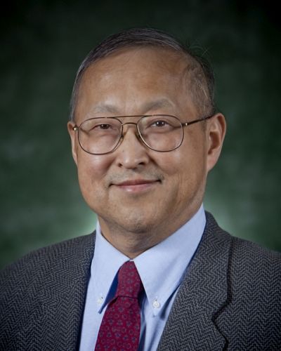 headshot of Masatsugu Suzuki