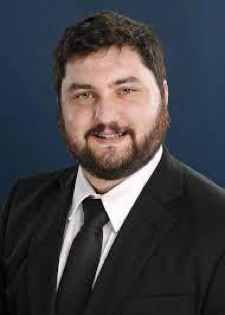 headshot of Thomas Komor