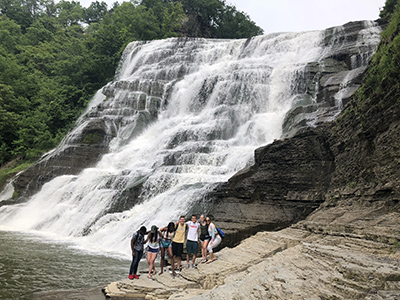 Group of students at waterfall