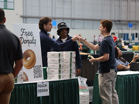 Fist bump at a job fair