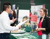 Binghamton University student networking at Job and Internship Fair
