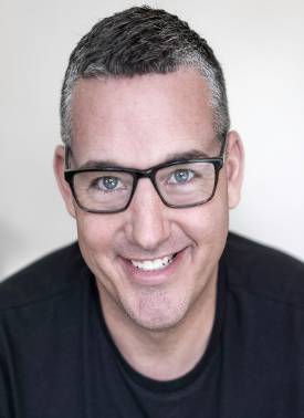 person with short hair headshot