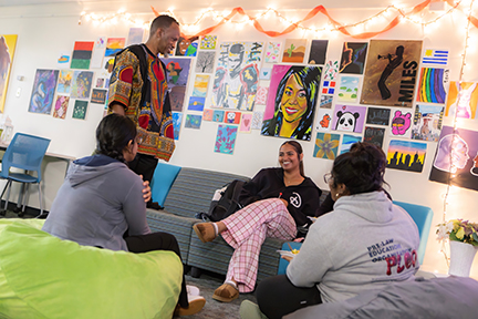 A group of students relaxing in the MRC lounge