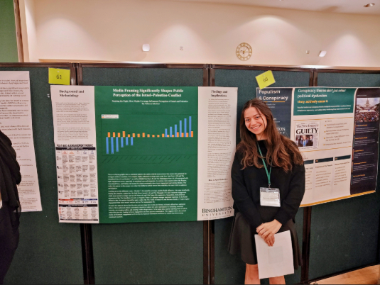 Rebecca showing her IMP poster