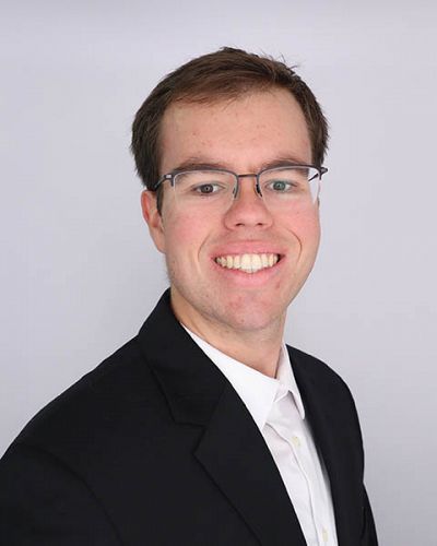 headshot of Benjamin Reid