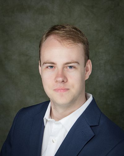 headshot of Evan Gartner