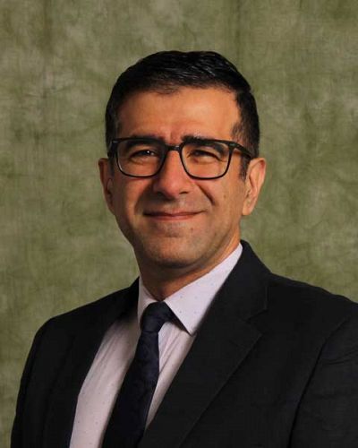 headshot of Omid Ghaemmaghami