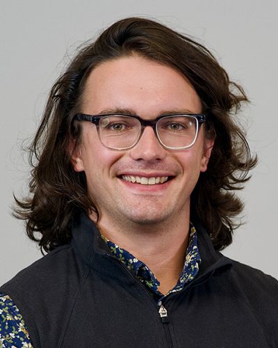 headshot of Tristan Sharratt, FNP, MPH