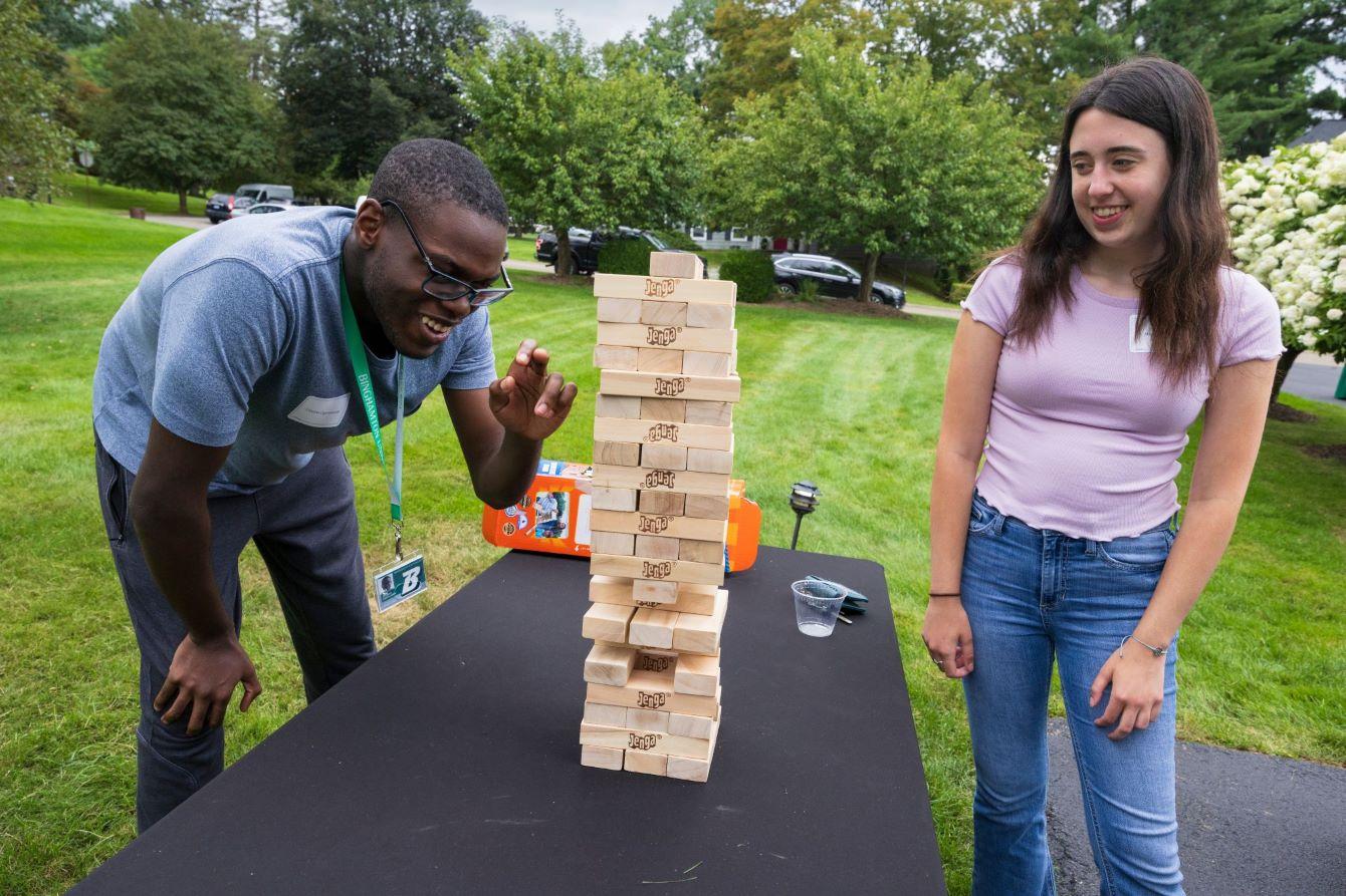 Scholars enjoy a game of jenga at the annual President's Picnic